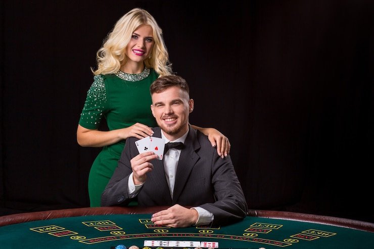Mobile phone displaying totobet wap live dealer table with deposit balance confirmed in header