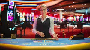 totobet wap NetEnt slots and live casino games displayed on mobile phone interface